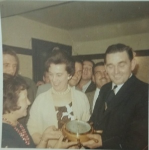 My grandparents being given a present by the staff and Customers in North and South
